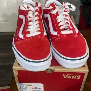 Red low top suede vans